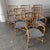 Design Plus Gallery presents a Set of Six Black & White Woven Rattan Bistro Dining Armchairs from CB2. This coordinated...