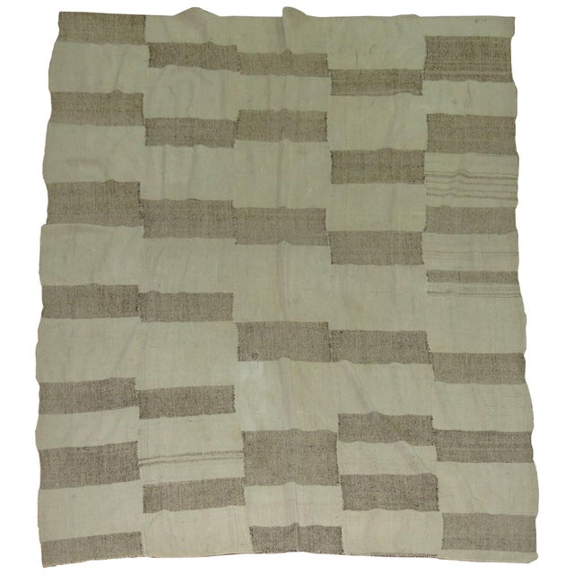 Turkish Kilim in khaki and brown.