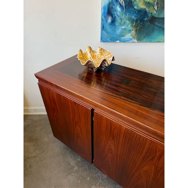 Beautiful Danish modern sideboard by Skovby, featuring incredible rosewood grain, four-door storage, adjustable shelving,...