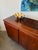 Beautiful Danish modern sideboard by Skovby, featuring incredible rosewood grain, four-door storage, adjustable shelving,...