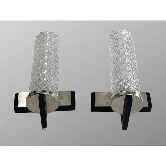 These vintage sconces were made in Germany in the 1960s and are getting harder to find. with a sculptural design, these...