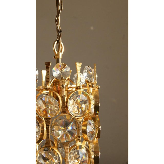Hollywood Regency Brass & Crystal Glass Ceiling Lamp by Christoph Palme for Palwa Crystal pendant lamp by Palwa. It is a...