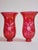 Pair of cranberry glass hurricane lamp shades featuring an etched foral design with flare top and 1" 5/8 fitter bases.