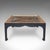 This is a vintage Chinoiserie coffee table. An Italian, gilt and ebonised pine accent table with handpainted top, dating...
