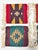 A colorful set of four vintage woven wool coasters featuring bold Southwestern geometric motifs in red, turquoise, gold,...