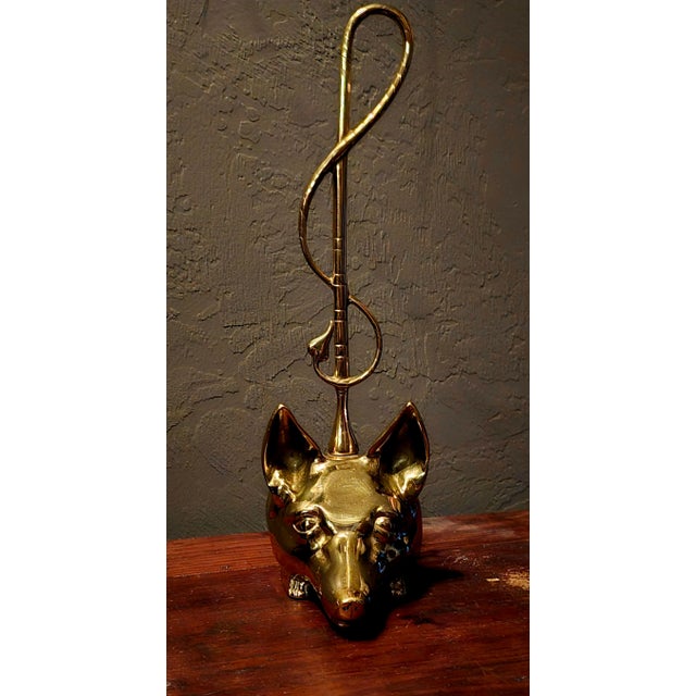 Mid-20th Century Virginia Metalcrafters Brass Fox Head and Riding Crop Doorstop A striking and collectible brass doorstop...