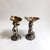 A charming pair of figural table salts, stamped Elkington Plate, likely Edwardian and in a late Victorian taste. Each...