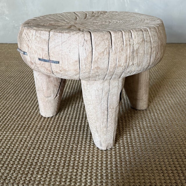 18"D x 13.5"H Crafted from solid elm wood, this hand-carved stump table brings organic warmth and sculptural character to...