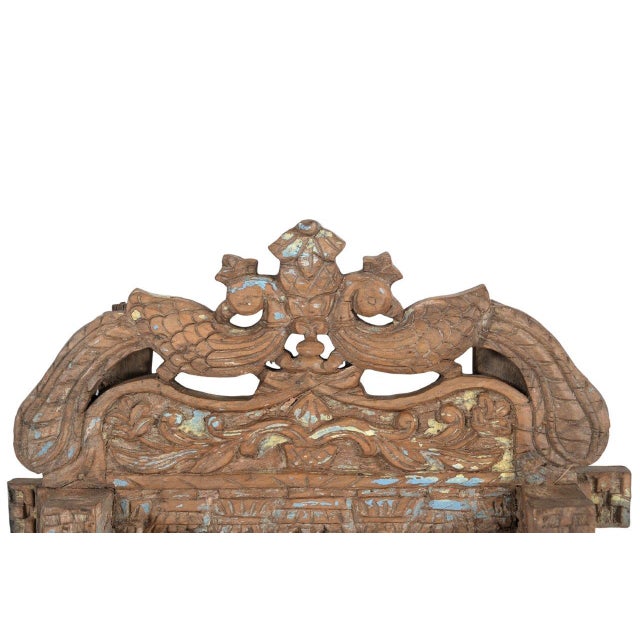 This Antique Indian Carved Teakwood Architectural Mirror is handcrafted from solid teakwood, featuring an elegant arch...
