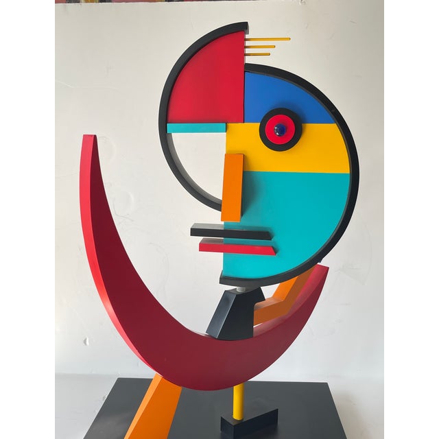 This a spectacular example of a Modern Abstract Geometric Face Sculpture. This sculpture is all wood in all different...