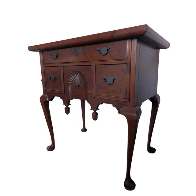 A fine quality hand crafted example of a Queen Anne style lowboy by Eldred Wheeler. Rectangular molded edge top, slate top...