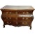 DETAILS Hand fashioned, in tombeau form, this antique French Rococo walnut chest of drawers displays beautifully carved...