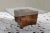 Thick walnut veneer is scored to wrap corners of a heavy biomorphic wood frame. The top is pieced with four sections of...