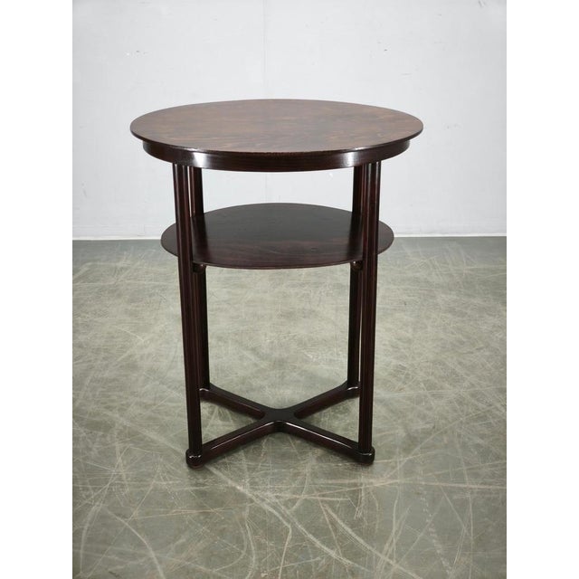 An elegant and highly collectible oval table designed by Josef Hoffmann and manufactured by Jacob & Josef Kohn, dating to...