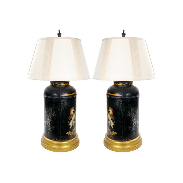 This elegant pair of English lamps was made in the late 19th century from antique black-painted tole canisters, each...