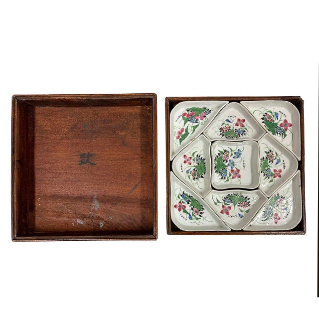 A set of antique Chinese famille rose porcelain nine-piece combined square dishes for sweetmeats or nuts, each dish...