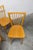 Set of four Baumann bistro chairs, model 153, stamped 1981. These beechwood chairs boast a timeless and elegant design,...