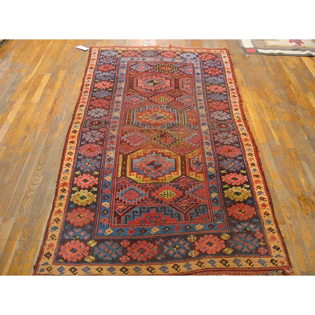 19th Century W. Persian Kurdish Carpet ( 4'2" x 7'6" - 127 x 230 ) Multi-color background with rows of geometric pattern....