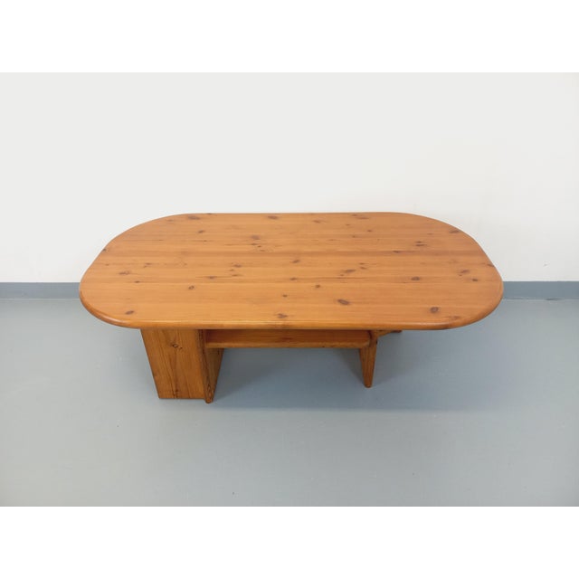 Vintage modernist coffee table from the 1970s, made of solid pine, in the style of Rainer Daumiller. Original and unusual...