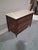 An elegant late 18th-century French Louis XVI commode, richly figured walnut and topped with its original white marble...