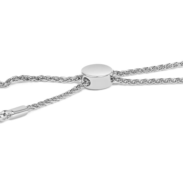 Crafted with grace, this exquisite bracelet blends timeless elegance and modern sophistication, fashioned from .925...