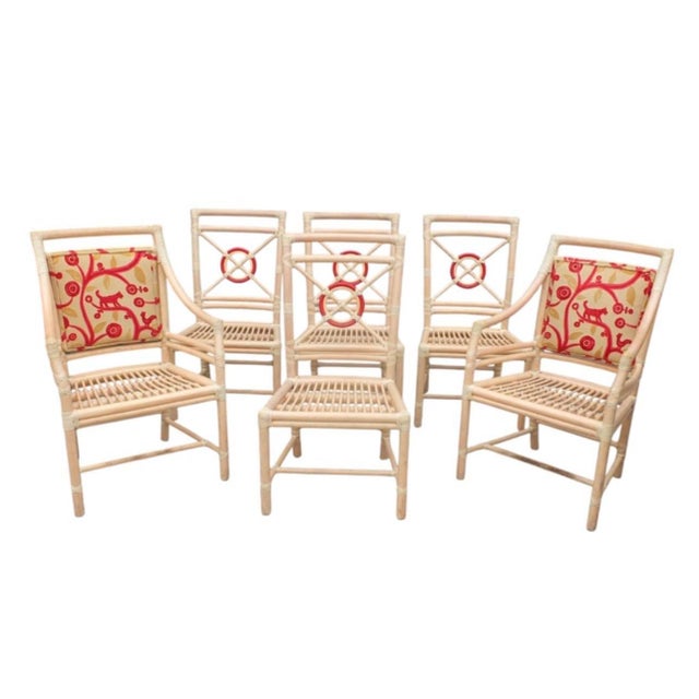 Elevate your dining space with this iconic set of six "Target Back" chairs by the renowned McGuire Furniture Company. This...