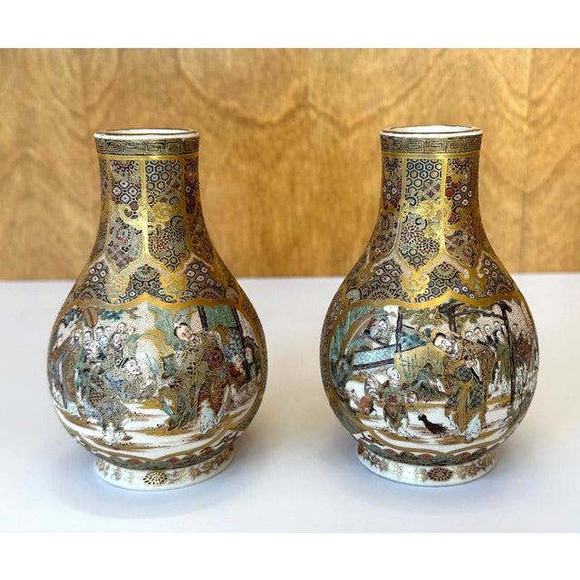 A pair of small ceramic vases with superb surface decorations made by Japanese studio Seikozan circa 1890-1910s (late...