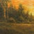 This oil painting captures a serene landscape along M-115, depicting a dense grove of trees bathed in warm, golden light...