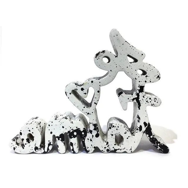 Acrylic paint on cast resin sculpture. Black and white color. Hand signed, numbered and dated on the underside by the...