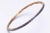 A pair of faceted, round sapphire bangles in an 18K gold setting. Inside circumference measures 2.5" Easy to stack with...