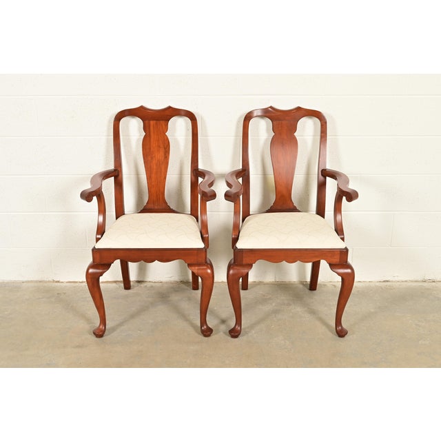 An outstanding pair of Queen Anne or Georgian style armchairs or dining captain chairs By Henkel Harris USA, Circa 1970s...