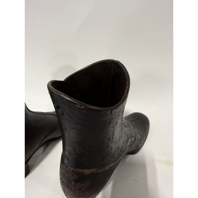 J.R. Palmenbergs & Sons, Near Pair Of Mannequin Boot Forms, American *These make great decorative door stops!* These near-...