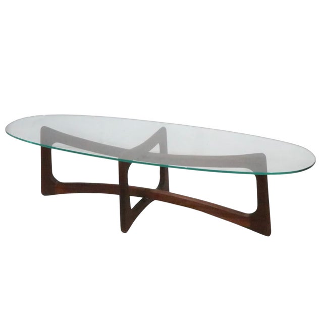 Iconic. mid century ribbon coffee table, designed by Adrian Pearsall c. 1950/60's. The table features an interlocking...