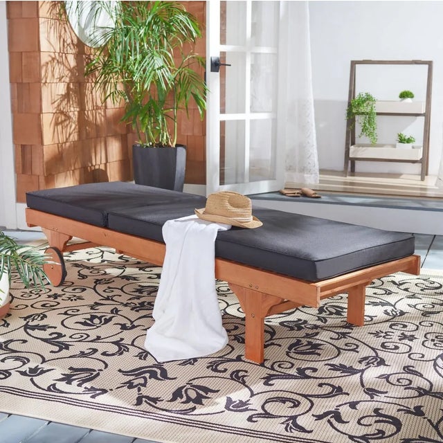 A fresh update of an English garden classic, the Newport Outdoor Lounge Chair recalls the manicured landscapes of Rhode...