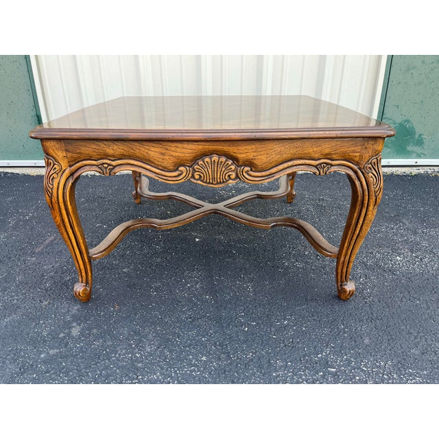 Mid-20th century Drexel Heritage walnut side table. Features a parquetry top and cabriole legs classic in French Country...