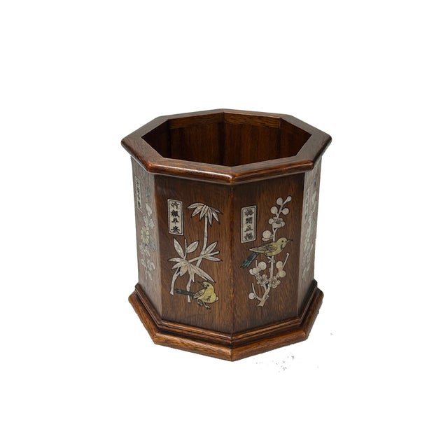 This vintage octagonal wood pot holder features a rich, dark brown finish that beautifully highlights the natural grain of...