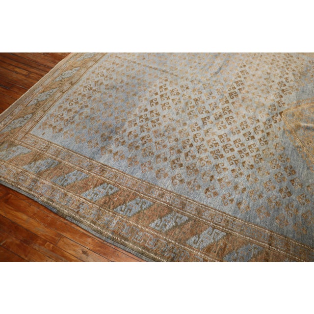 Mid-20th century Persian Kurd rug with powder blue field with a silver striation on 1 end, accents in brown. Measures:...