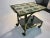 Beautiful and great modern design brass bar cart with inlaid hand painted tile top. Depicting Paris, London, Madrid,...