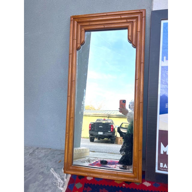 A fantastic cascading faux bamboo mirror. It is double framed all around. Bring this Classic palm beach chic mirror into...