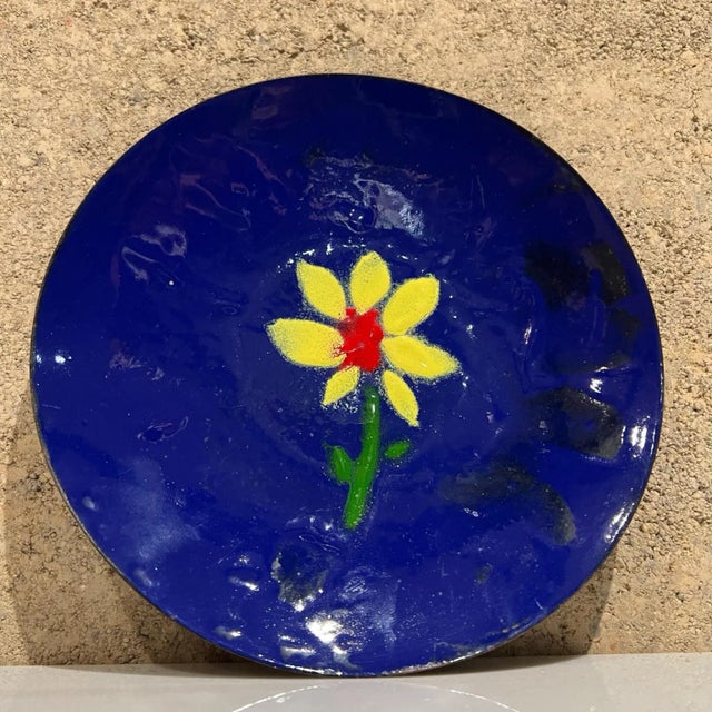 AMBIANIC presents 1960s Modern Copper Enamel Royal Blue Plate Yellow Daisy Flower signed, appears as J Phalen 1967 on...