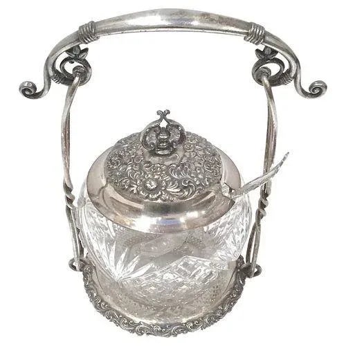 Antique Aesthetic Movement cut-glass and silver-plate sugar bowl with a scrolled handle attached to the caddy and...