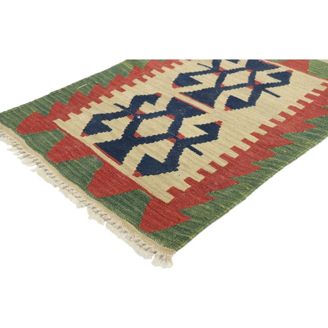 , vintage Persian Shiraz Kilim rug with Tribal style. Full of tiny details and a bold expressive design combined with...