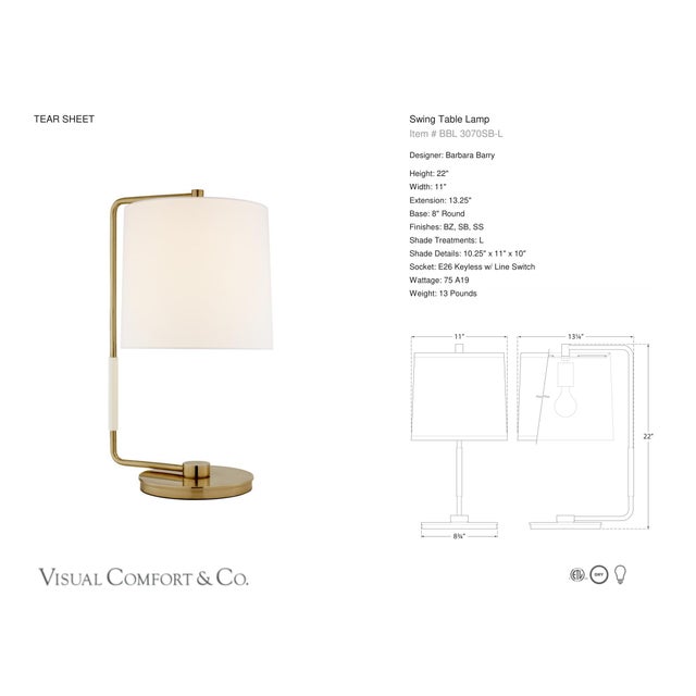 Barbara Barry by Visual Comfort Signature Swing Table Lamp in Soft Brass with Linen Shade Designer: Barbara Barry Height:...
