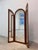 A particularly rare mid-century piece! An elegant, three-panel mirror from the Danish manufacturer Fakse Furniture. The...