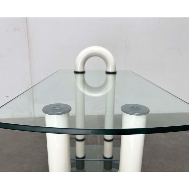 Postmodern bar cart from the 1980s by the Italian manufacturer Metalnova. The design impresses with its clear geometry and...