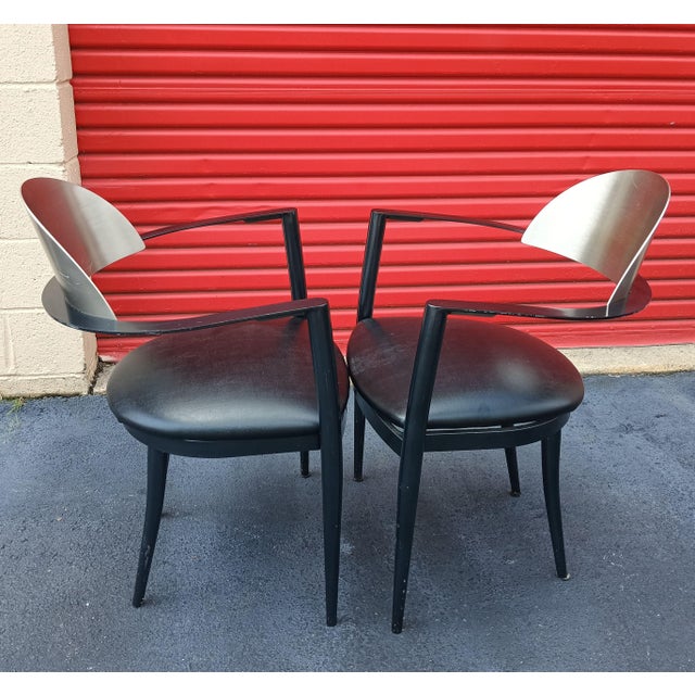 Elevate your space with this stunning pair of Elite Modern Jagger Armchairs, where architectural innovation meets premium...