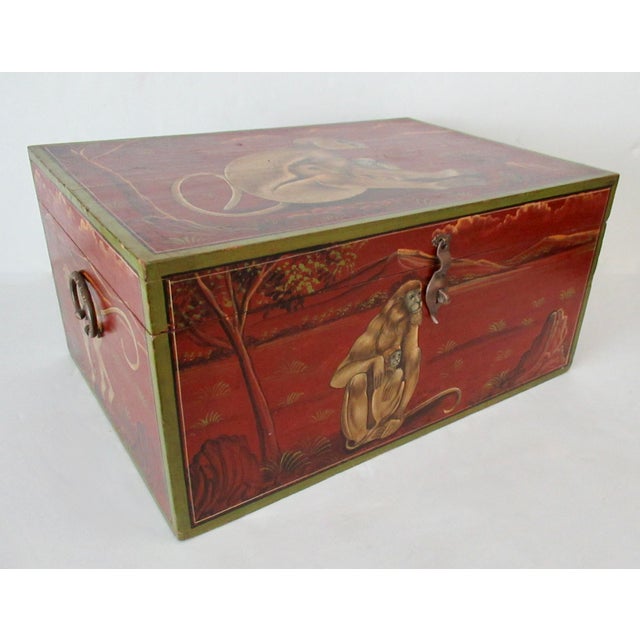 Vintage: Anglo-Indian, hand-crafted and painted, brass hinged back and clasped Lidded chest/storage trunk. A burnished red...