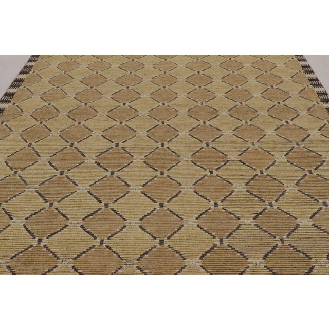 Made with hand-knotted wool, this 8x10 modern rug design is an exciting new addition to Rug & Kilim’s Scandinavian rug...