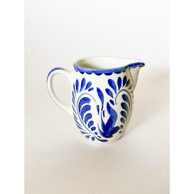 The classic and collectible Anfora Blue and White pattern in a cute creamer pitcher. Use this pretty piece for creamer,...
