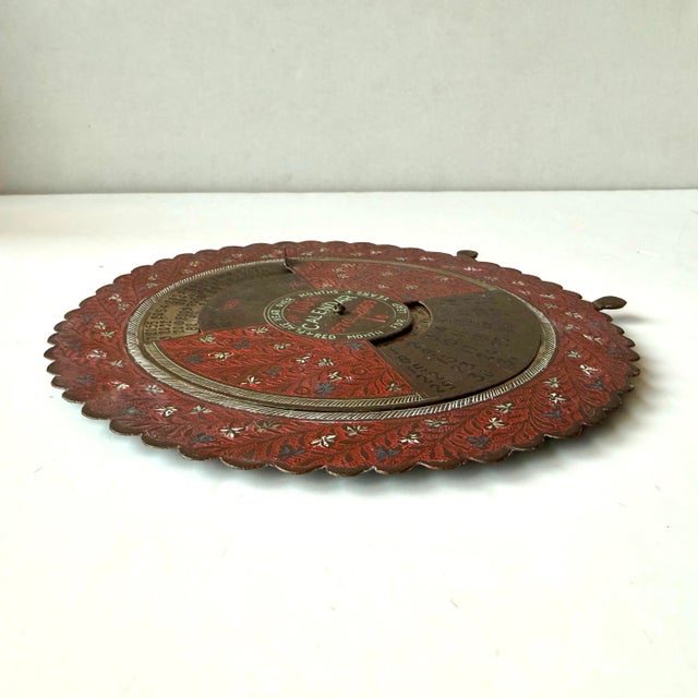Vintage embossed brass perpetual 100-year calendar spanning the years 1970-2069. Easel attached to the back. Made in India.